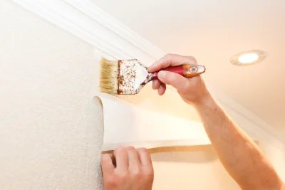 Pose de papier peint à la Loge — revêtements muraux et toiles de verre